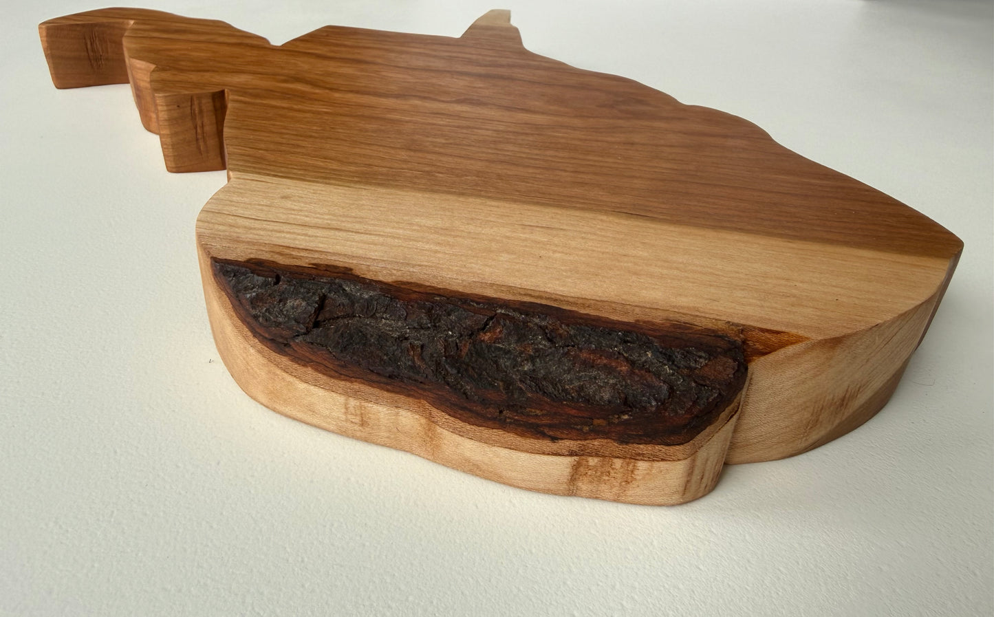 West Virginia shaped charcuterie board. Side view.
