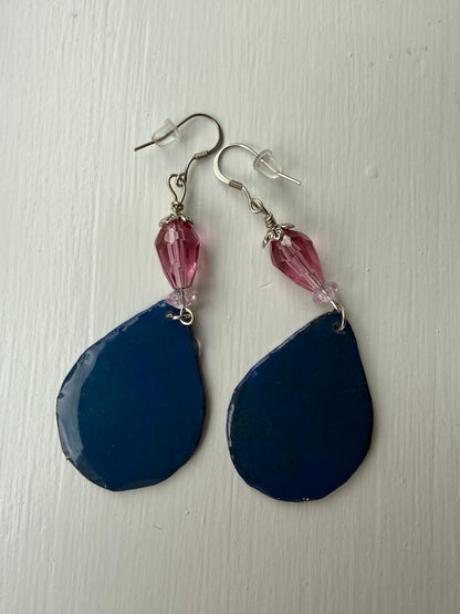 Navy blue teardrop-shaped earrings with pink beads 