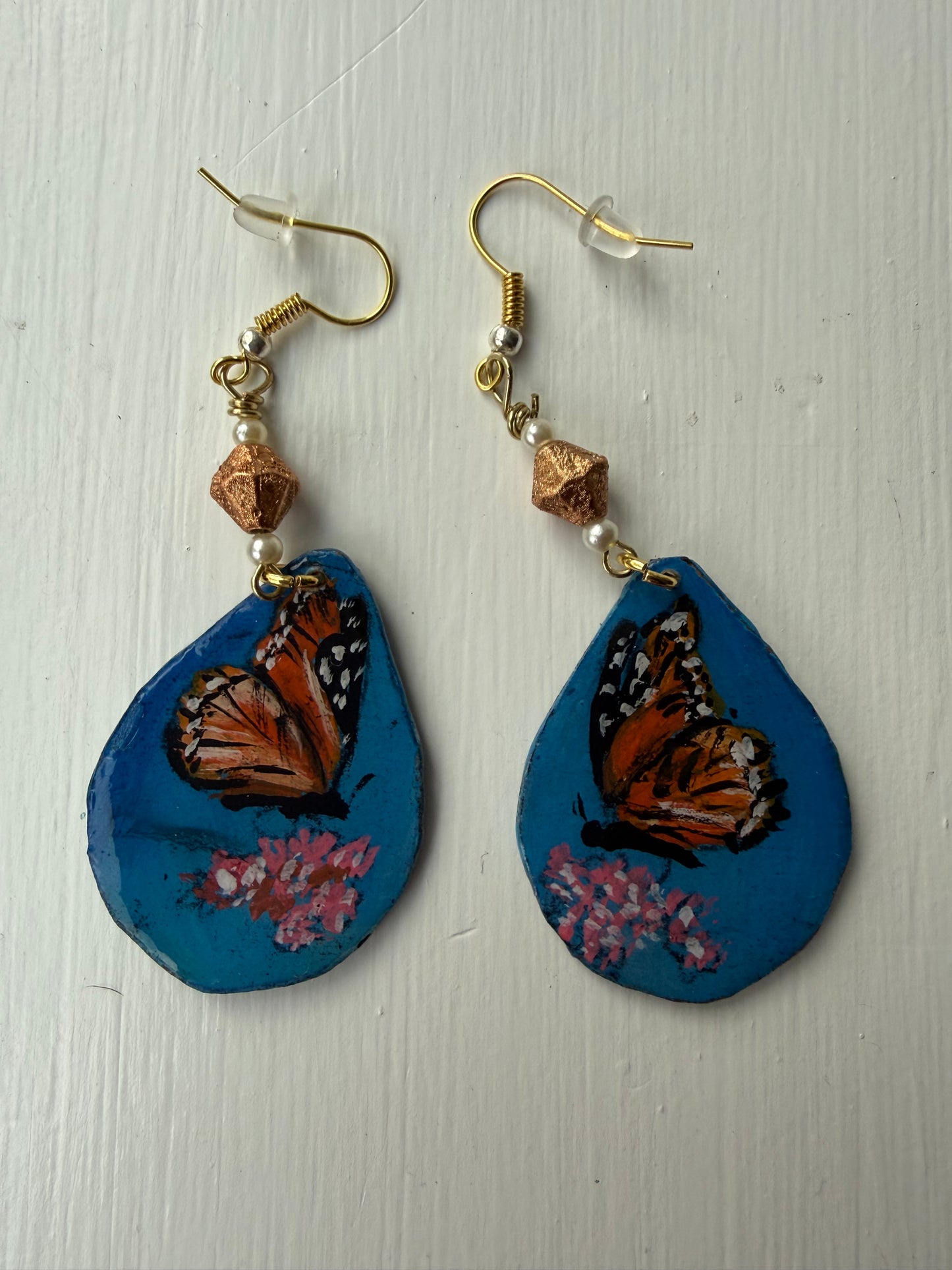 Pair of earrings with a monarch butterfly on each one