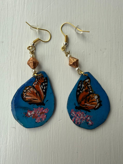 Pair of earrings with a monarch butterfly on each one