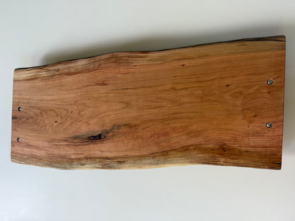 Back of wooden charcuterie board